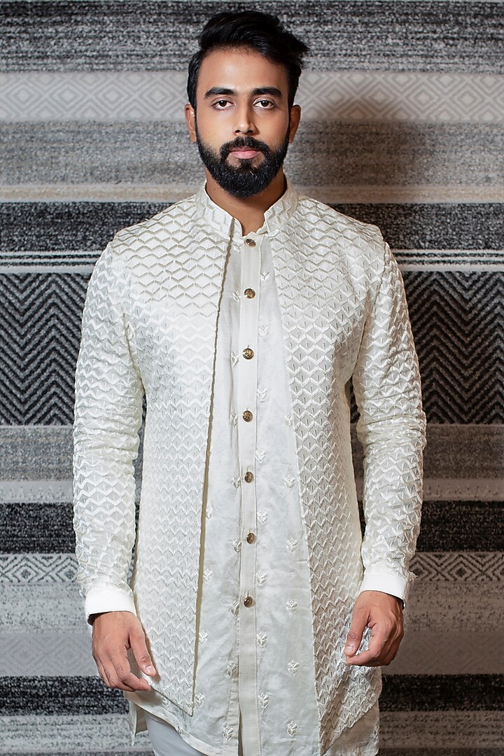 Off White Asymmetrical Kurta Set With Embroidered Open Jacket by YAJY By Aditya Jain at Pernia's Pop Up Shop