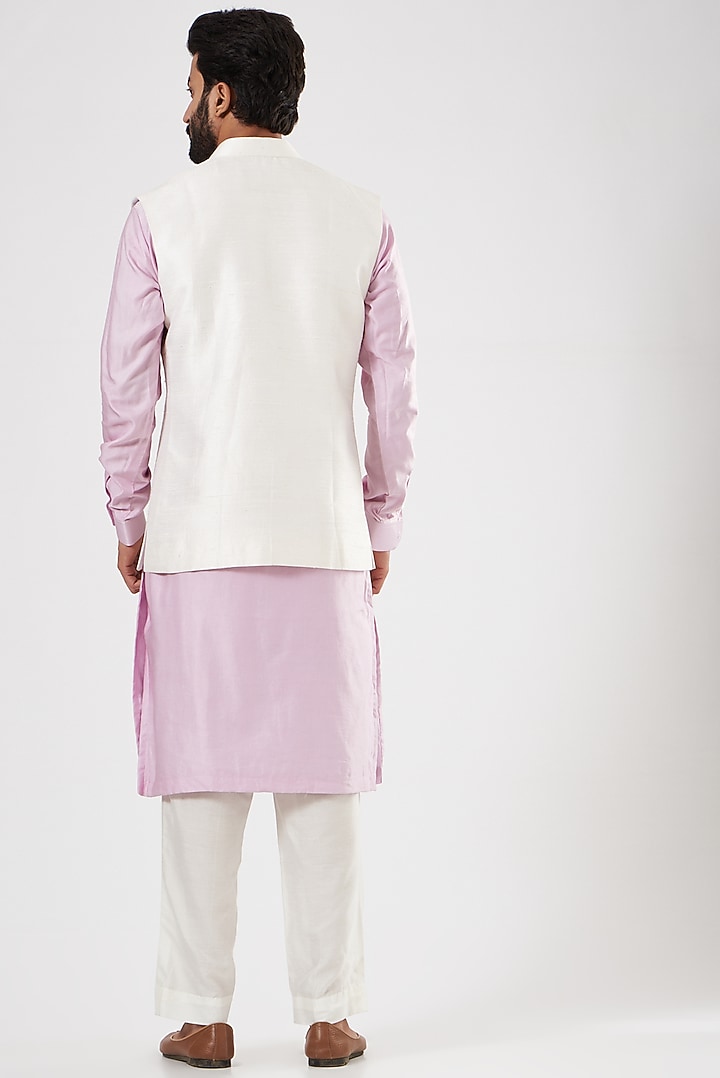 Off-White Raw Silk Nehru Jacket Set by YAJY By Aditya Jain at Pernia's Pop Up Shop