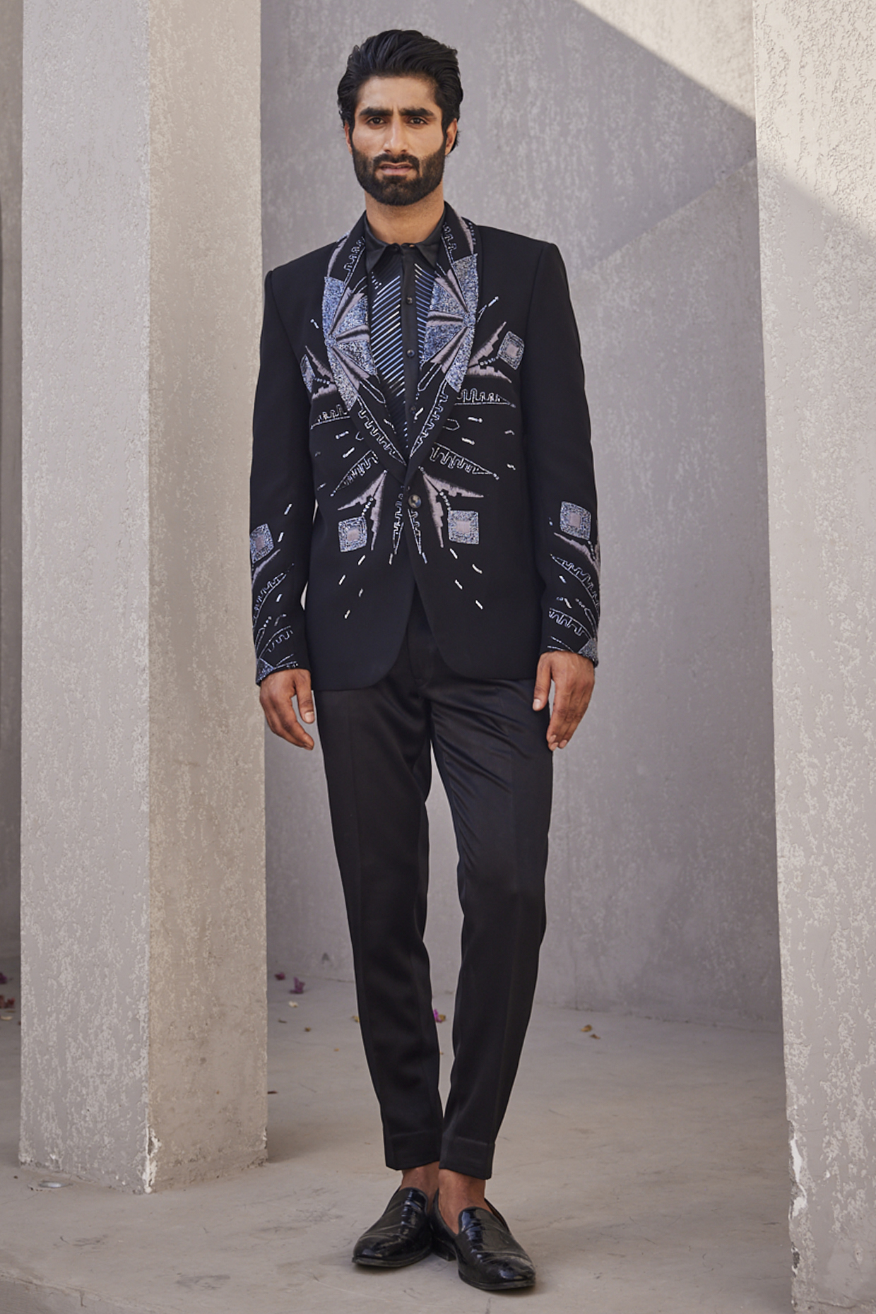 Black Italian Suiting Embroidered Tuxedo Set by YAJY By Aditya Jain at Pernia's Pop Up Shop