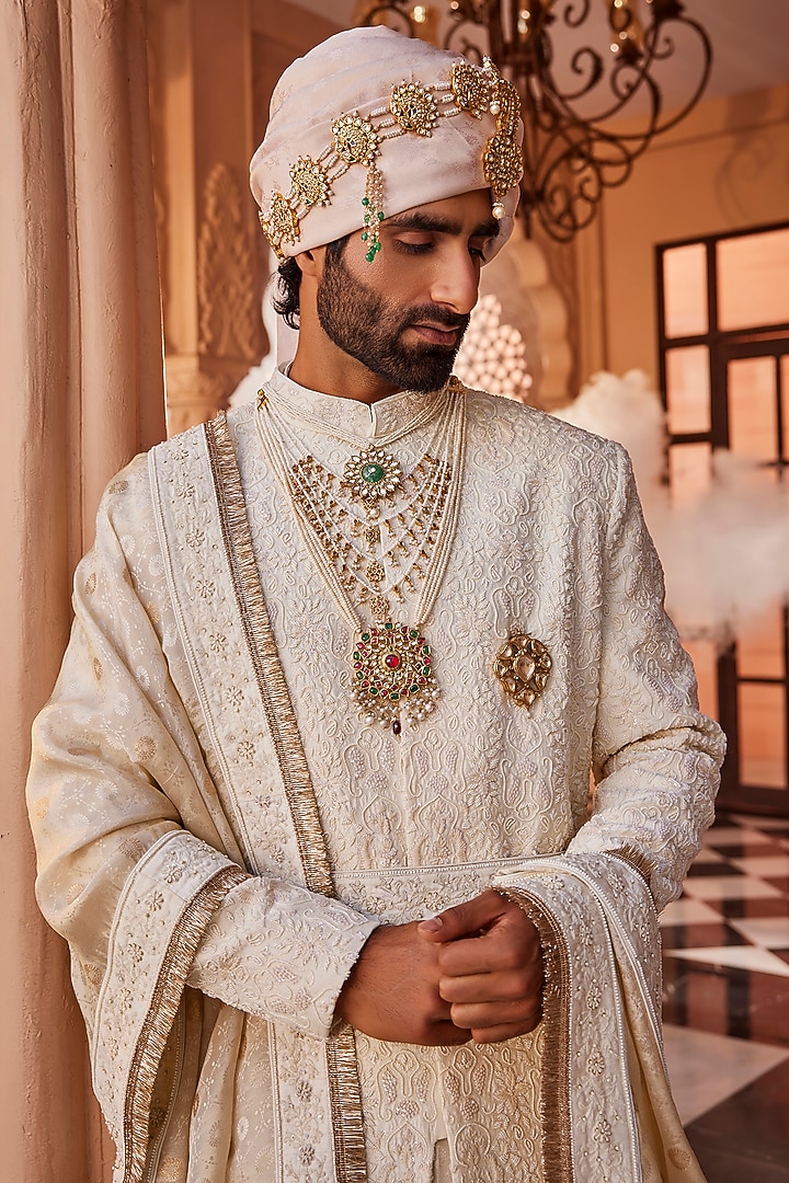Ivory Silk Resham Motifs Embroidered Groom Sherwani Set by YAJY By Aditya Jain at Pernia's Pop Up Shop