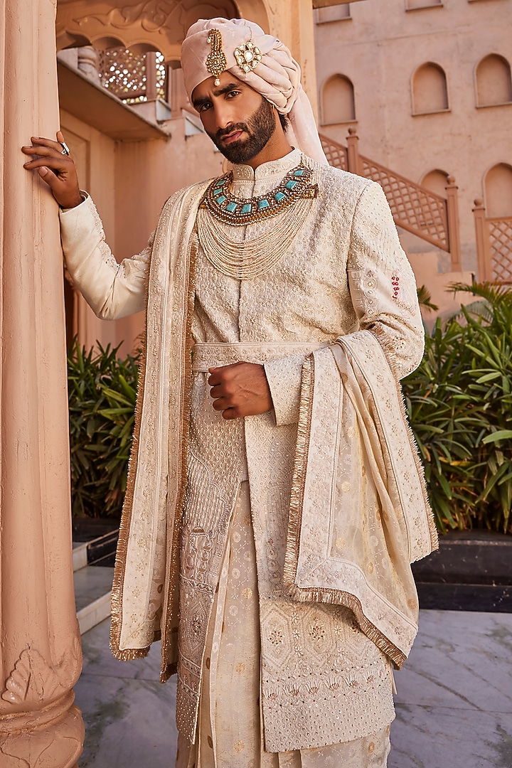 Ivory Silk Motif Embroidered Groom Sherwani Set by YAJY By Aditya Jain at Pernia's Pop Up Shop