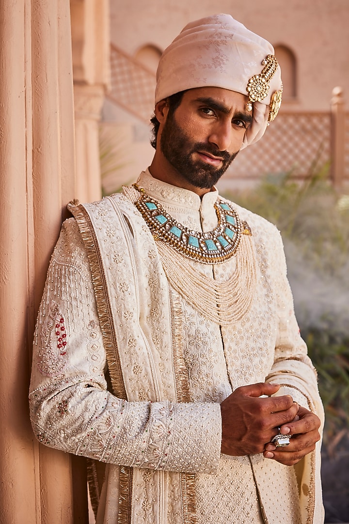 Ivory Silk Motif Embroidered Groom Sherwani Set by YAJY By Aditya Jain at Pernia's Pop Up Shop