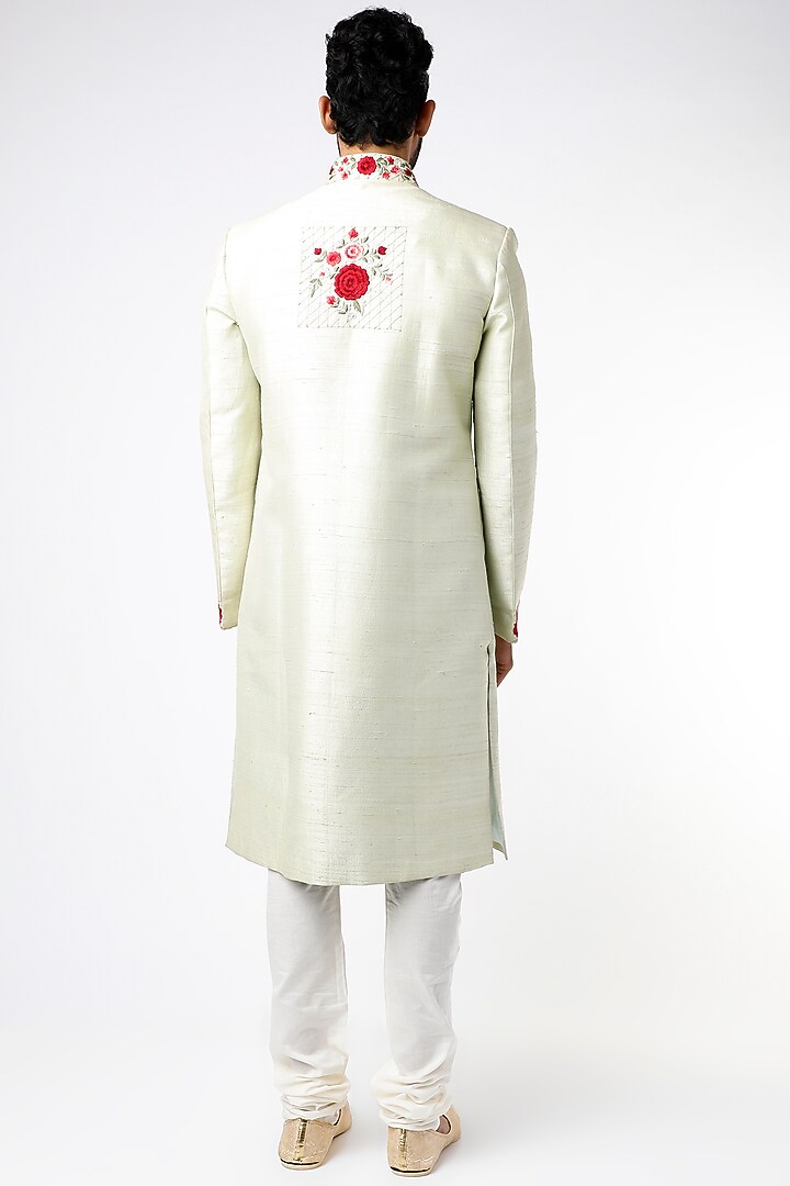 Mint Green Raw Silk Floral Embroidered Wedding Sherwani Set by YAJY By Aditya Jain at Pernia's Pop Up Shop