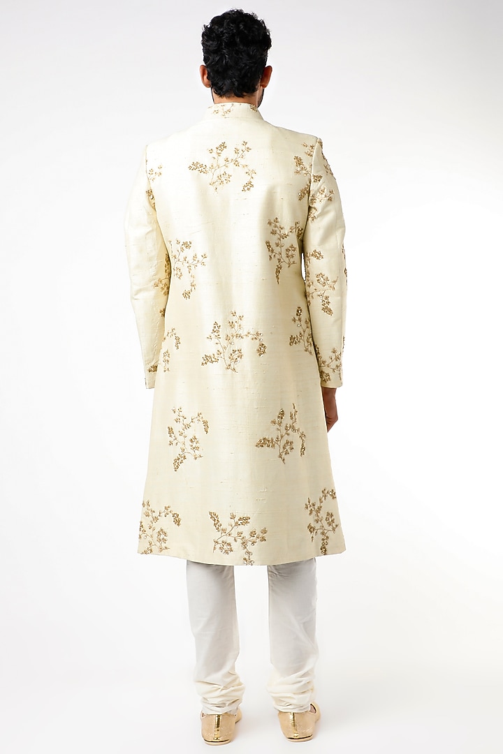 Beige Raw Silk Hand & Machine Embroidered Wedding Sherwani Set by YAJY By Aditya Jain at Pernia's Pop Up Shop