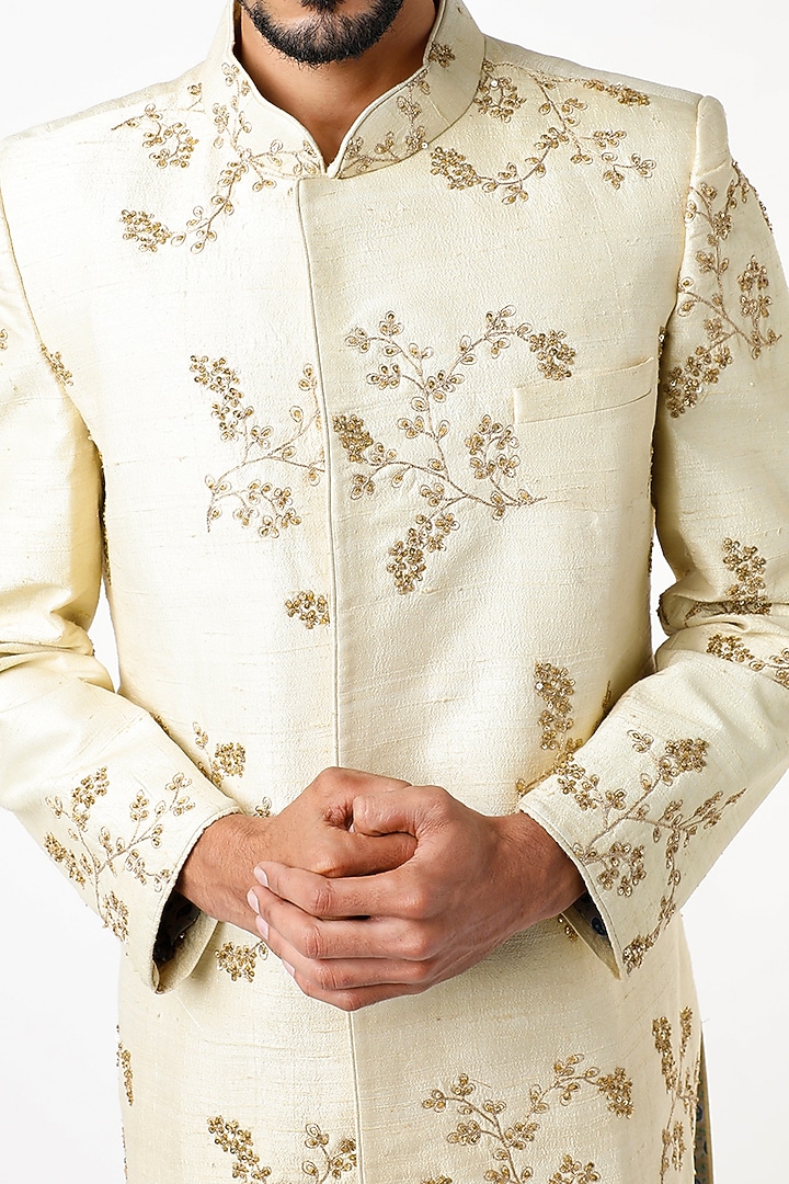 Beige Raw Silk Hand & Machine Embroidered Wedding Sherwani Set by YAJY By Aditya Jain at Pernia's Pop Up Shop