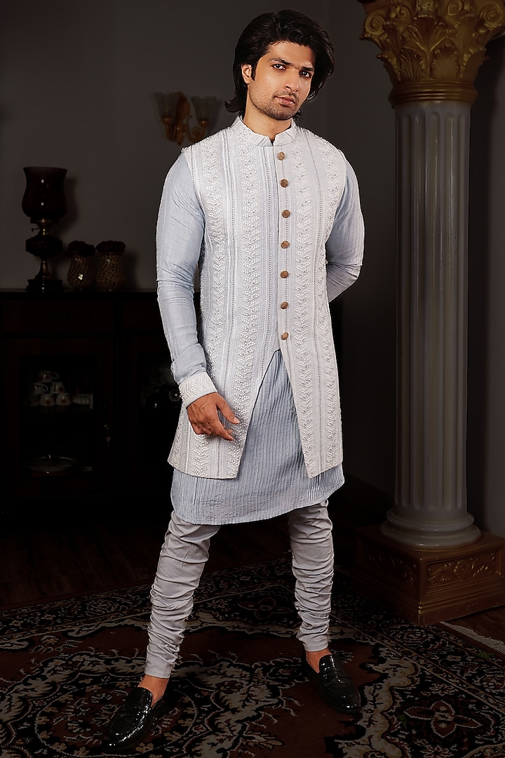 Powder Blue Silk Textured Chikankari Work Bundi Jacket by YAJY By Aditya Jain