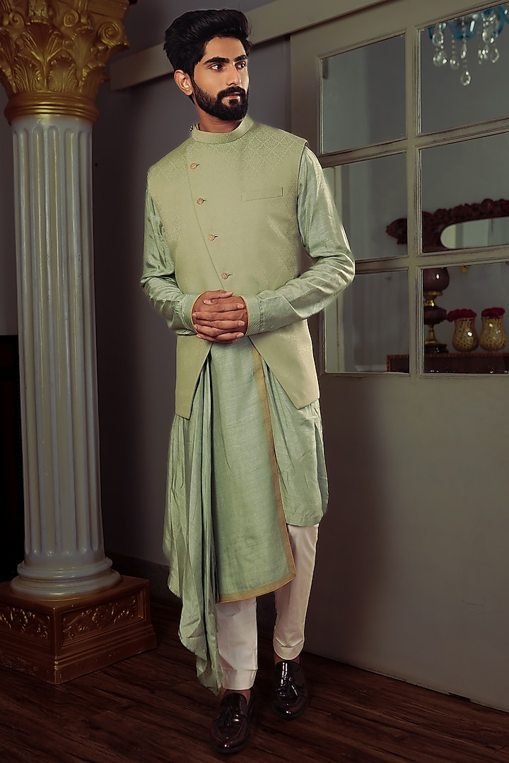 Olive Green Silk Kurta Set With Bundi Jacket by YAJY By Aditya Jain