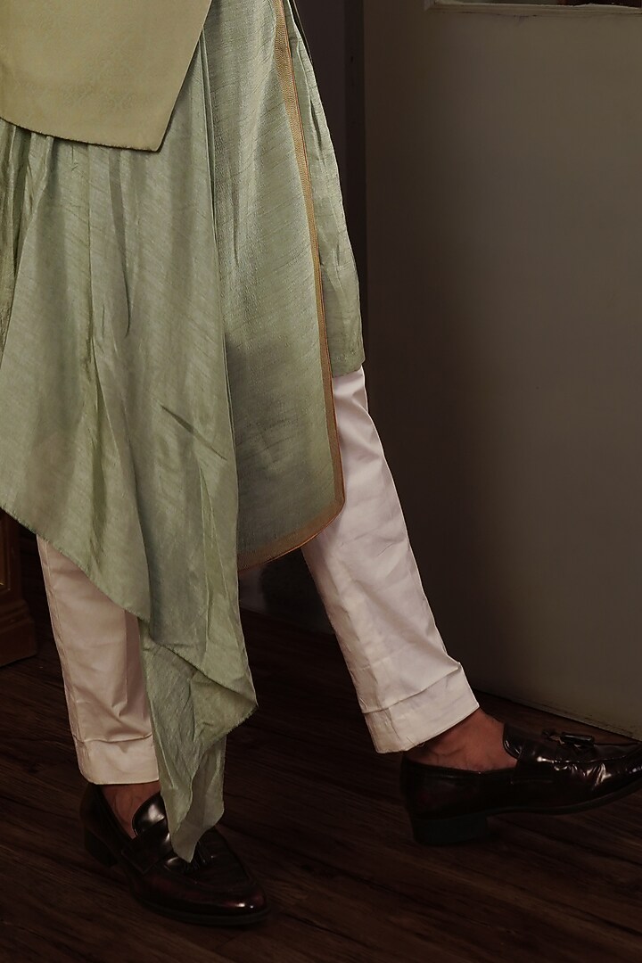 Olive Green Silk Kurta Set With Bundi Jacket by YAJY By Aditya Jain at Pernia's Pop Up Shop