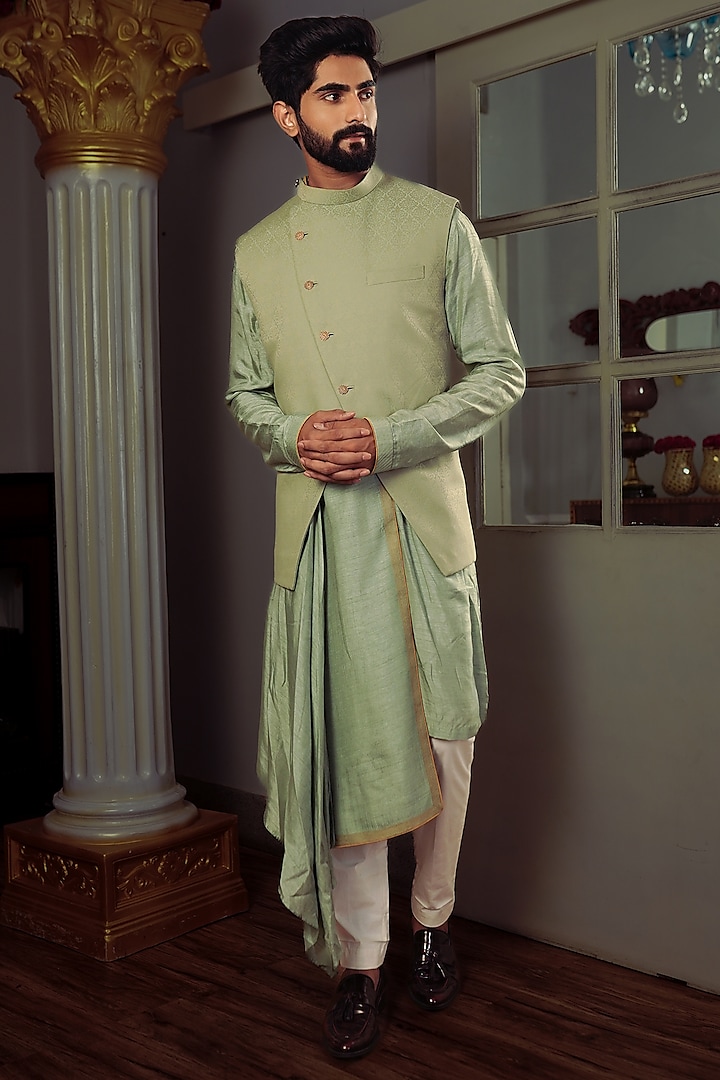 Olive Green Silk Bundi Jacket by YAJY By Aditya Jain