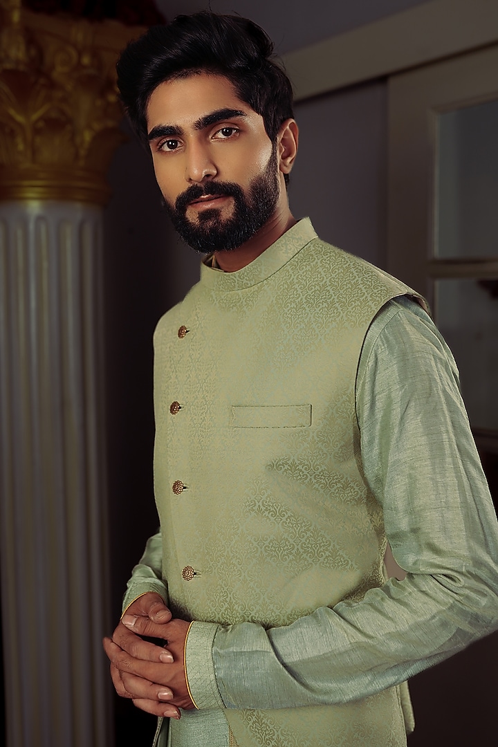 Olive Green Silk Printed Bundi Jacket by YAJY By Aditya Jain at Pernia's Pop Up Shop