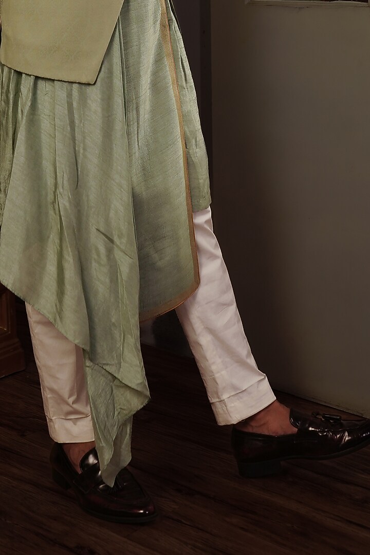 Olive Green Silk Printed Bundi Jacket by YAJY By Aditya Jain at Pernia's Pop Up Shop