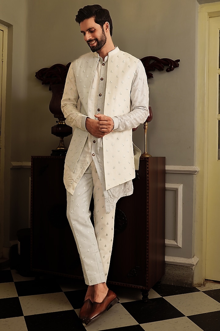 Powder Blue Silk Kurta Set With Bundi Jacket by YAJY By Aditya Jain