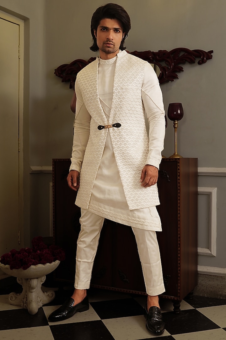 White Silk Hand Embroidered Bundi Jacket by YAJY By Aditya Jain at Pernia's Pop Up Shop