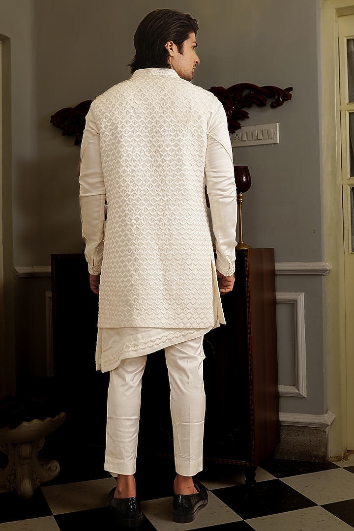 White Silk Hand Embroidered Bundi Jacket by YAJY By Aditya Jain at Pernia's Pop Up Shop