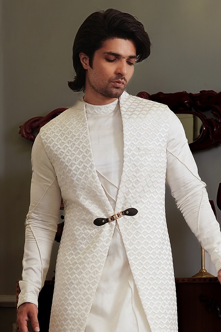 White Silk Hand Embroidered Bundi Jacket by YAJY By Aditya Jain at Pernia's Pop Up Shop