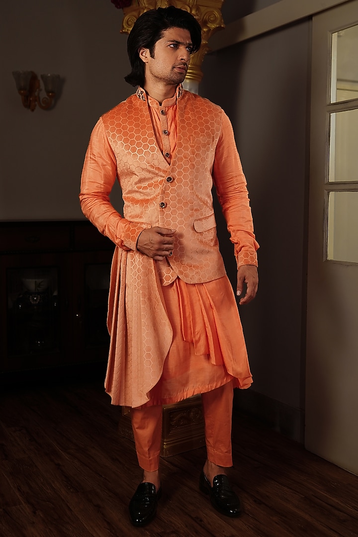 Orange Silk Neo Printed & Embroidered Pleated Bundi Jacket by YAJY By Aditya Jain at Pernia's Pop Up Shop