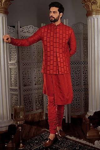 Rust Silk Asymmetrical Bundi Jacket by YAJY By Aditya Jain