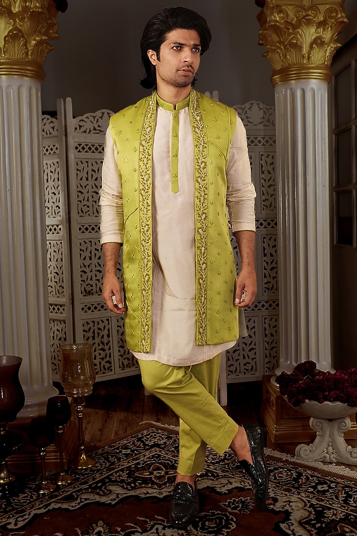 Pista Green Silk Motif Hand Embroidered Bundi Jacket by YAJY By Aditya Jain at Pernia's Pop Up Shop