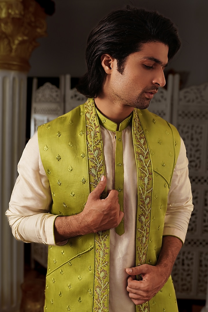 Pista Green Silk Motif Hand Embroidered Bundi Jacket by YAJY By Aditya Jain at Pernia's Pop Up Shop