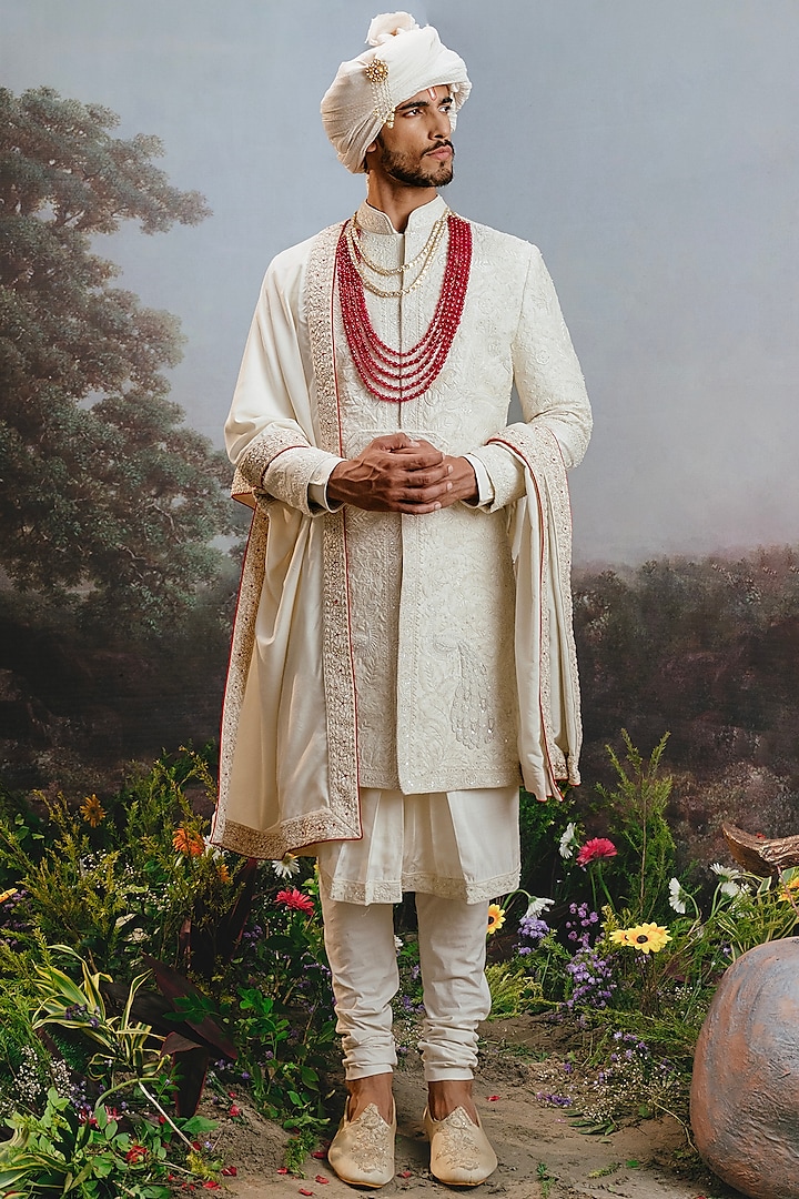 Ivory Raw Silk Embroidered Groom Sherwani Set by YAJY By Aditya Jain at Pernia's Pop Up Shop