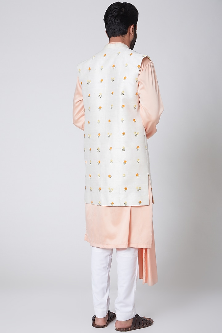 Peach Silk Asymmetric Pleated Kurta With Jacket by YAJY By Aditya Jain at Pernia's Pop Up Shop