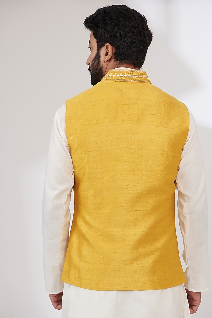 Mustard Yellow Raw Silk Embroidered Nehru Jacket by Yashodhara Men at Pernia's Pop Up Shop