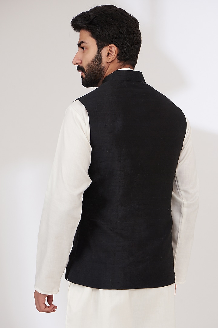 Black Raw Silk Embroidered Nehru Jacket by Yashodhara Men at Pernia's Pop Up Shop