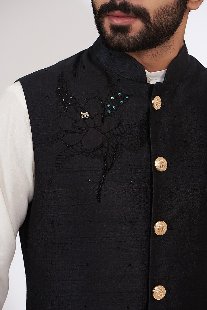 Black Raw Silk Embroidered Nehru Jacket by Yashodhara Men at Pernia's Pop Up Shop