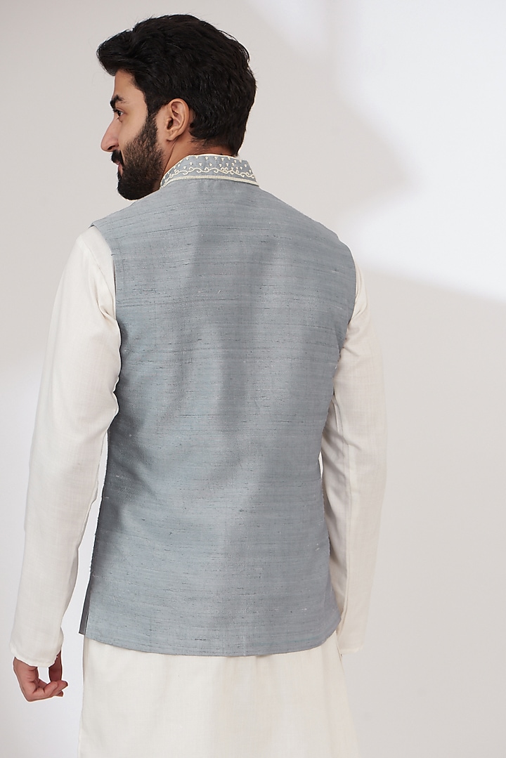 Dull Blue Raw Silk Embroidered Nehru Jacket by Yashodhara Men at Pernia's Pop Up Shop