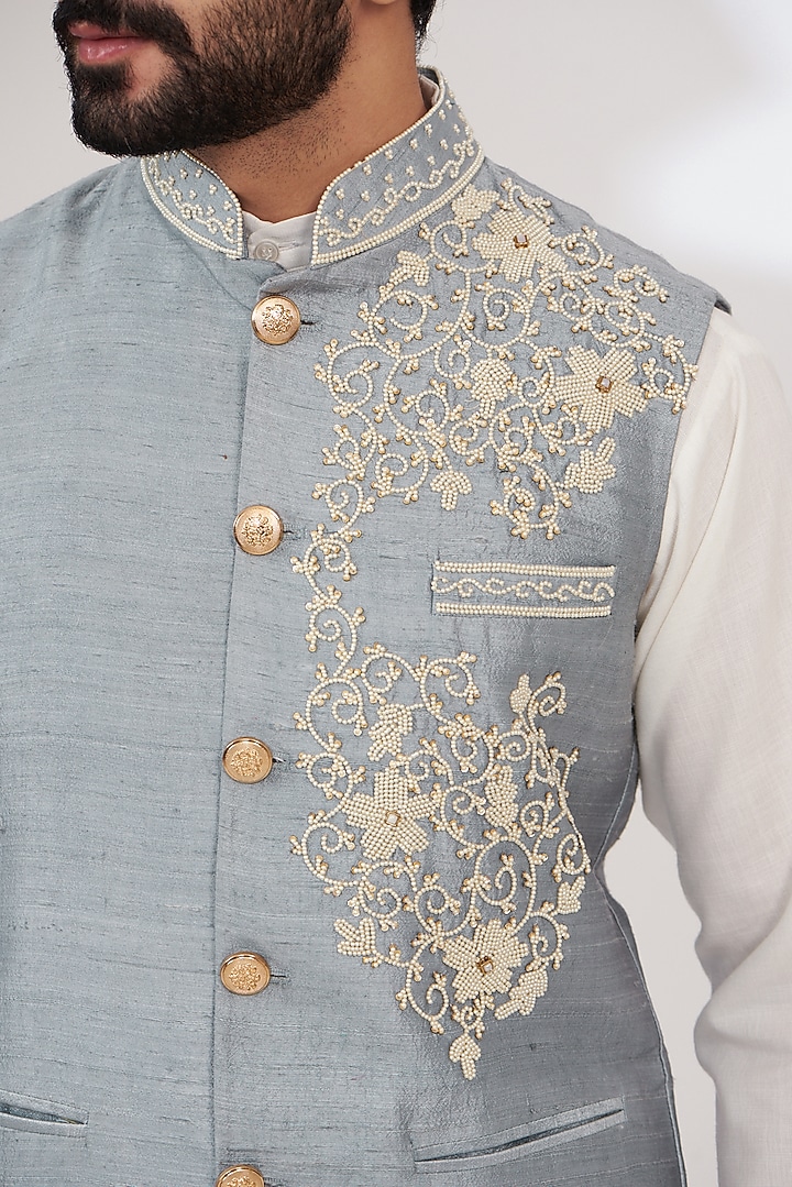 Dull Blue Raw Silk Embroidered Nehru Jacket by Yashodhara Men at Pernia's Pop Up Shop