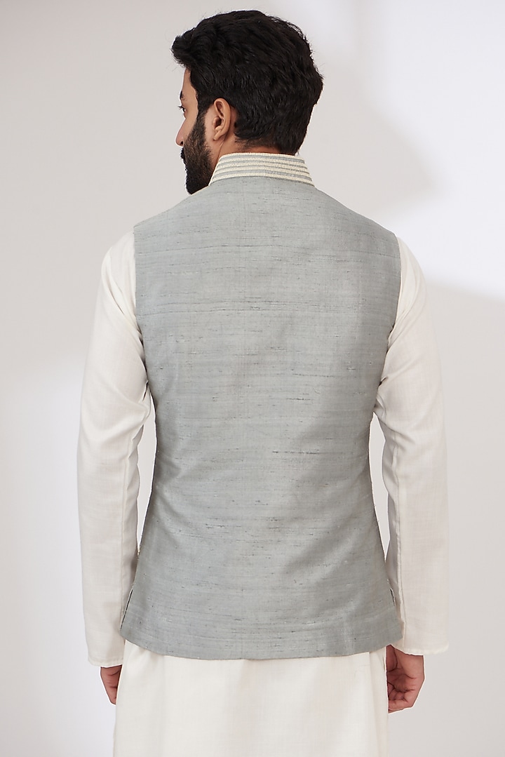 Dull Blue Raw Silk Embroidered Nehru Jacket by Yashodhara Men at Pernia's Pop Up Shop