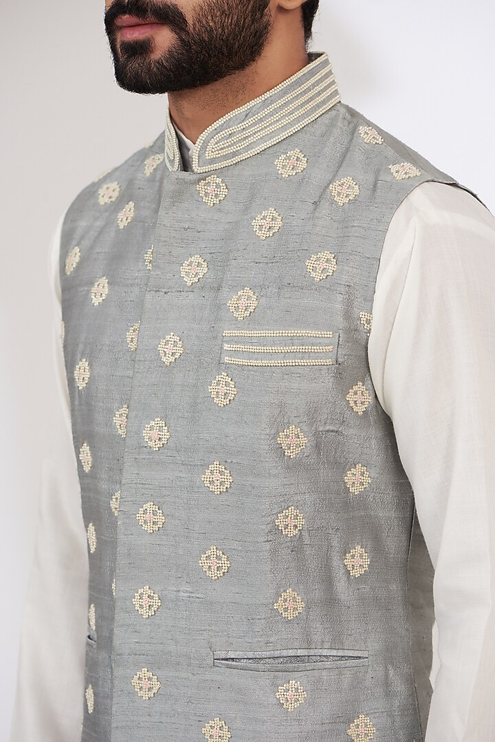 Dull Blue Raw Silk Embroidered Nehru Jacket by Yashodhara Men at Pernia's Pop Up Shop