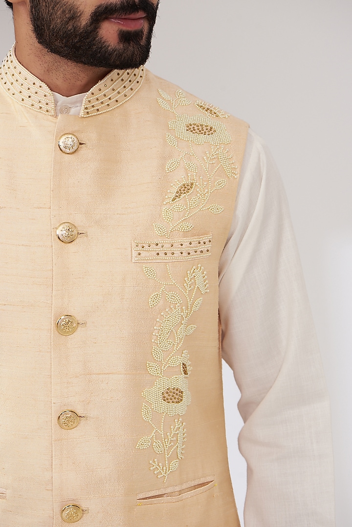 Peach Raw Silk Embroidered Nehru Jacket by Yashodhara Men at Pernia's Pop Up Shop