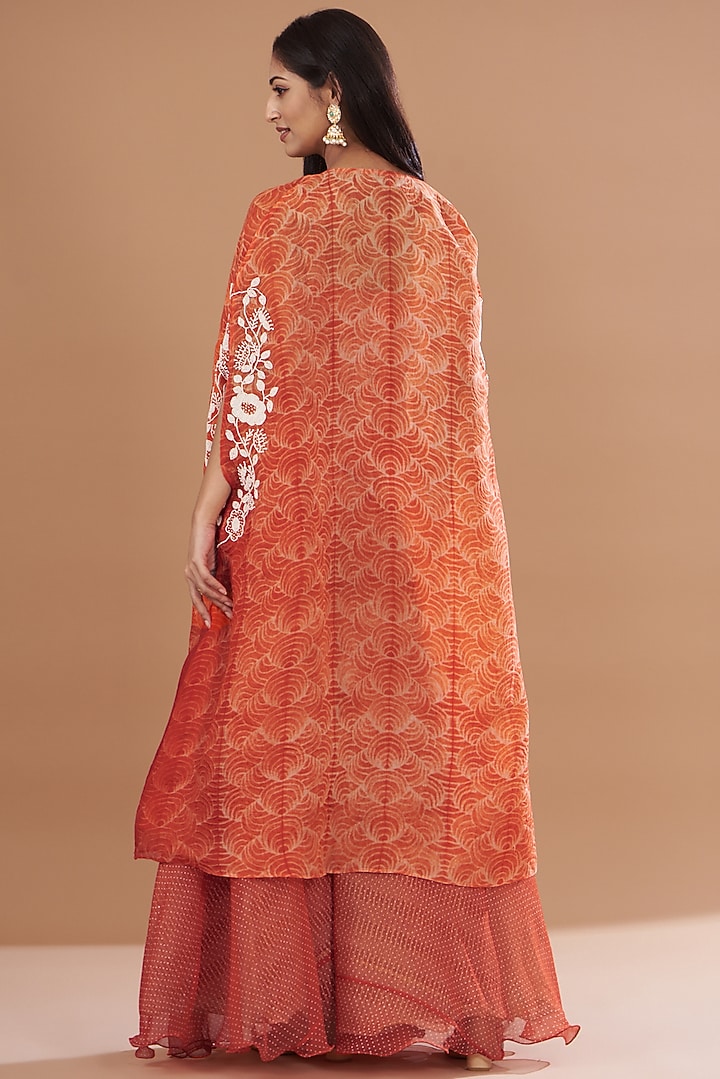 Red Organza & Chiffon Embroidered Jumpsuit With Shibori Cape by Yashodhara at Pernia's Pop Up Shop