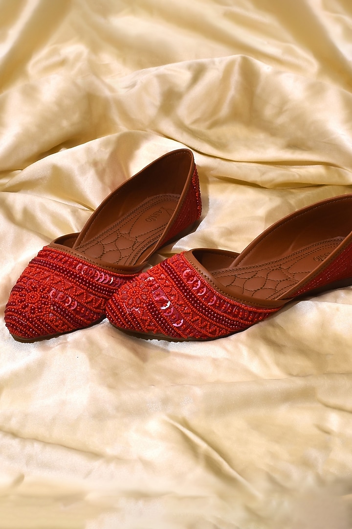 Red Silk Pearl & Bead Hand Embroidered Juttis by YASSIO at Pernia's Pop Up Shop