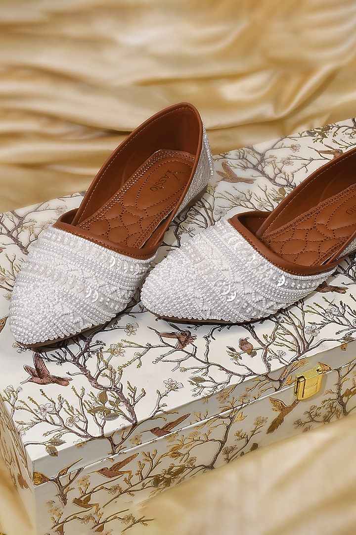 White Silk Pearl & Bead Hand Embroidered Juttis by YASSIO at Pernia's Pop Up Shop