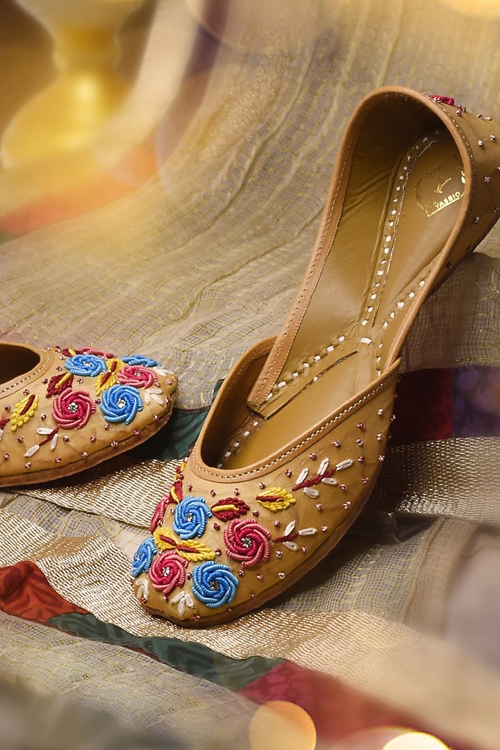 Beige Raw Silk Floral Thread & Bead Embroidered Juttis by YASSIO at Pernia's Pop Up Shop