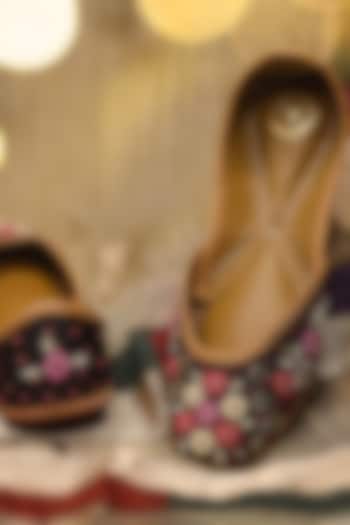 Black Raw Silk Floral Thread & Bead Embroidered Juttis by YASSIO at Pernia's Pop Up Shop