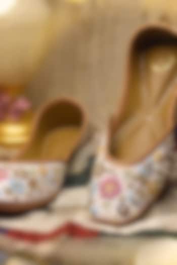 White Raw Silk Thread & Floral Embroidered Juttis by YASSIO at Pernia's Pop Up Shop