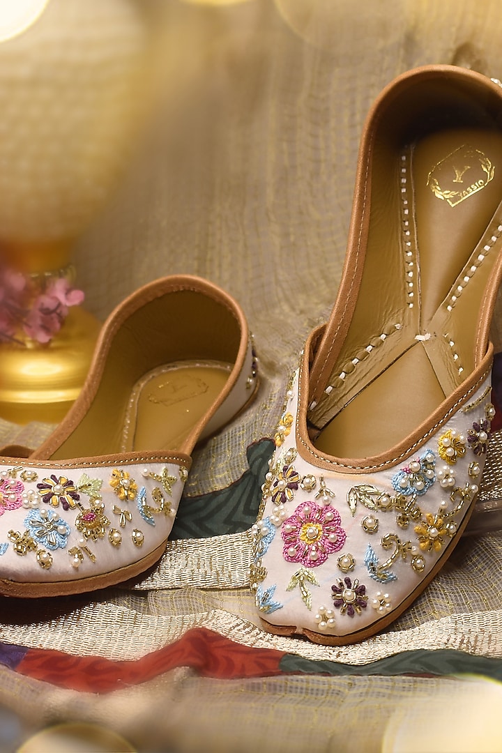 White Raw Silk Thread & Floral Embroidered Juttis by YASSIO at Pernia's Pop Up Shop