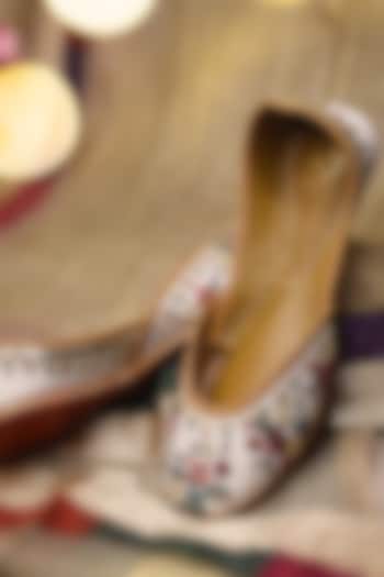 White Raw Silk Sequins & Pearl Embroidered Juttis by YASSIO at Pernia's Pop Up Shop