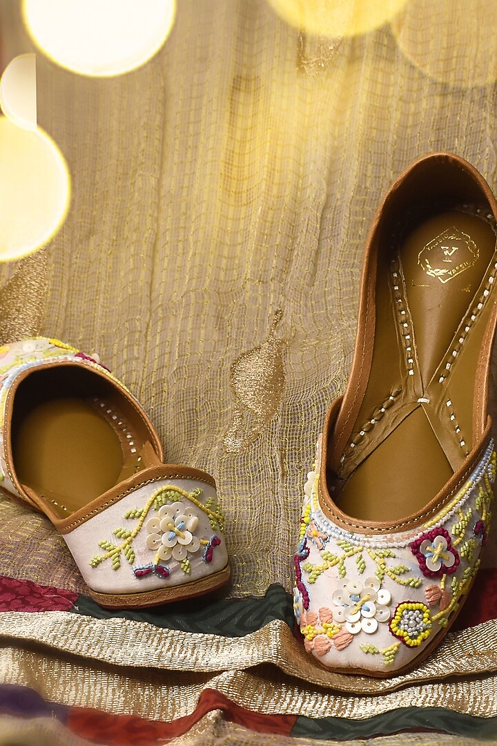 White Raw Silk Pearl & Floral Embroidered Juttis by YASSIO at Pernia's Pop Up Shop