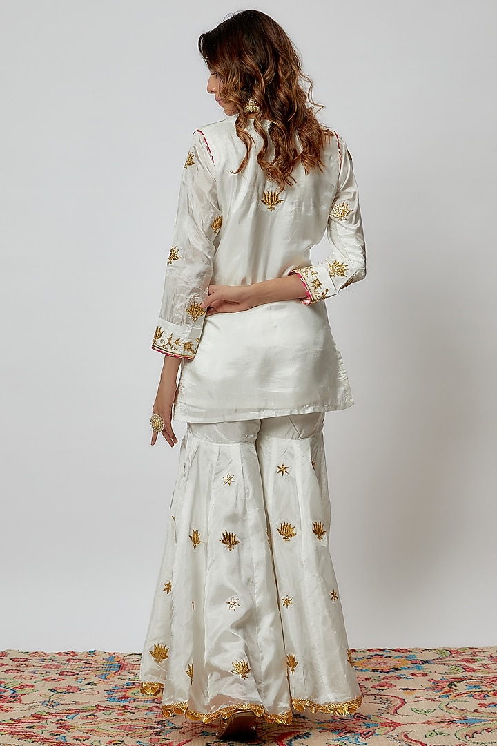 Ivory Pure Spun Silk Embroidered Party Wear Sharara Set by Yuvrani Jaipur at Pernia's Pop Up Shop