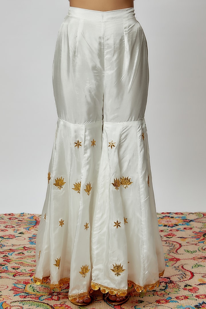 Ivory Pure Spun Silk Embroidered Party Wear Sharara Set by Yuvrani Jaipur at Pernia's Pop Up Shop