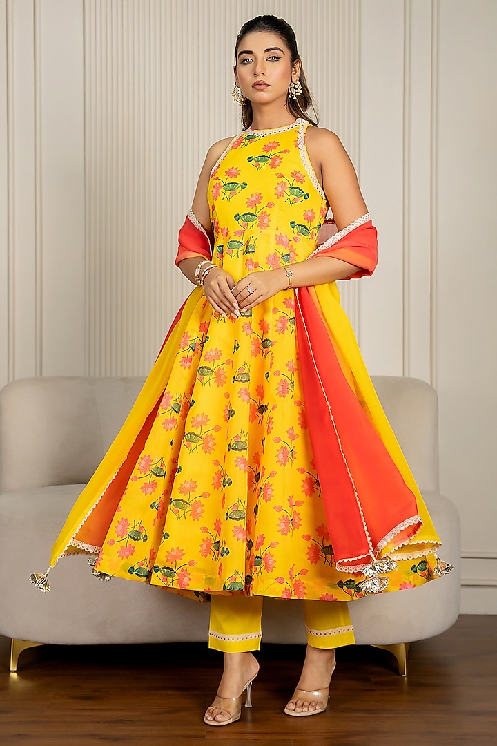 Yellow Chanderi Floral Printed & Lace Embroidered Anarkali Set by Yuvrani Jaipur at Pernia's Pop Up Shop