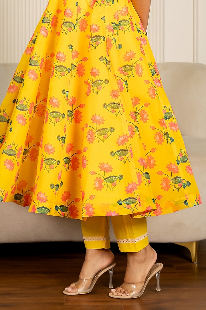 Yellow Chanderi Floral Printed & Lace Embroidered Anarkali Set by Yuvrani Jaipur at Pernia's Pop Up Shop