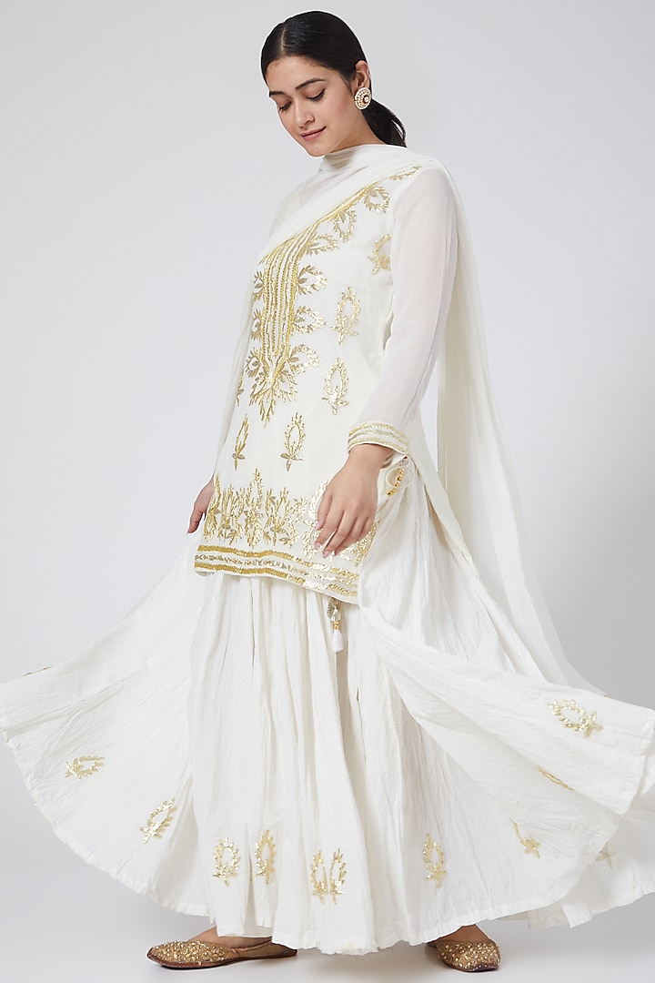 Ivory Machine Embroidered Skirt Set by Yuvrani Jaipur