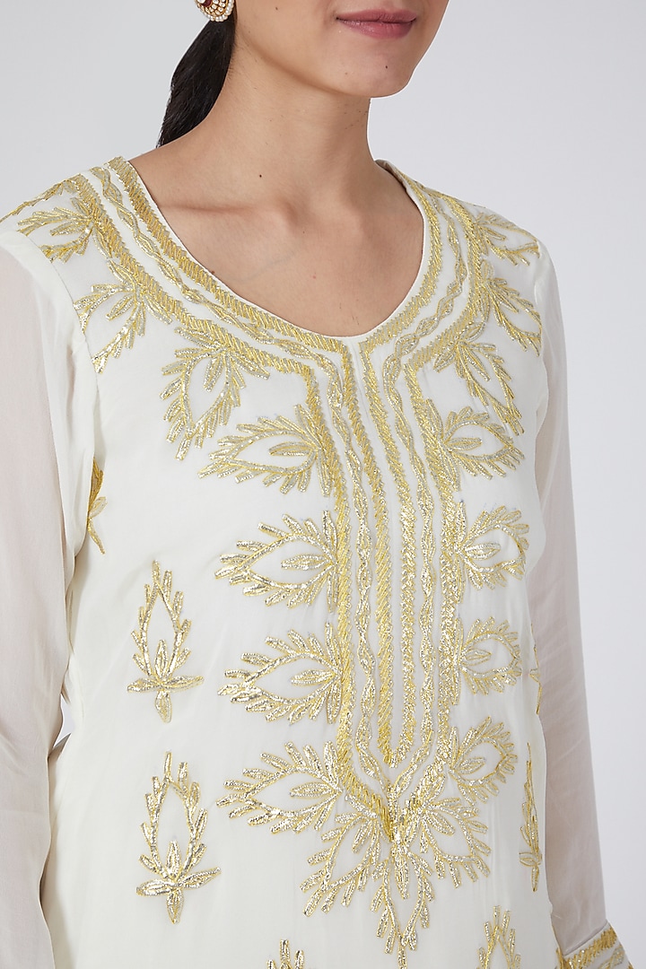 Ivory Machine Embroidered Skirt Set by Yuvrani Jaipur at Pernia's Pop Up Shop