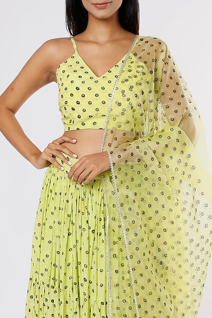 Neon Green Printed Layered Lehenga Set by Yuvrani Jaipur at Pernia's Pop Up Shop