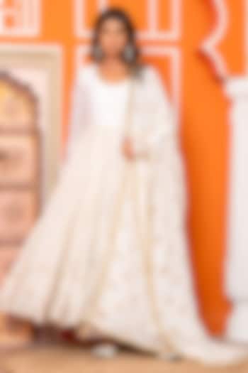 Ivory Muslin Foil Printed Party Wear Anarkali Set by Yuvrani Jaipur at Pernia's Pop Up Shop